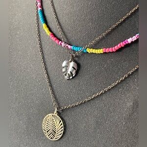 Clair’s necklace . Gold Palm Leaf Cutout Tropical Multi Strand Choker Necklace